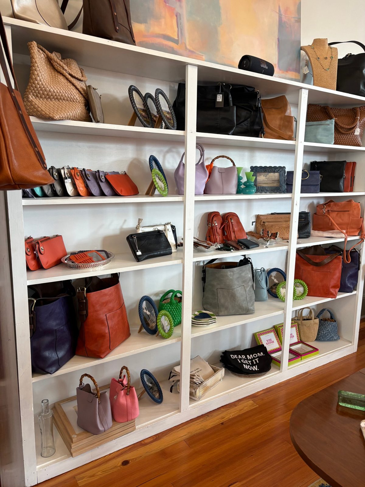 Shelves of handbags, frames and small gifts