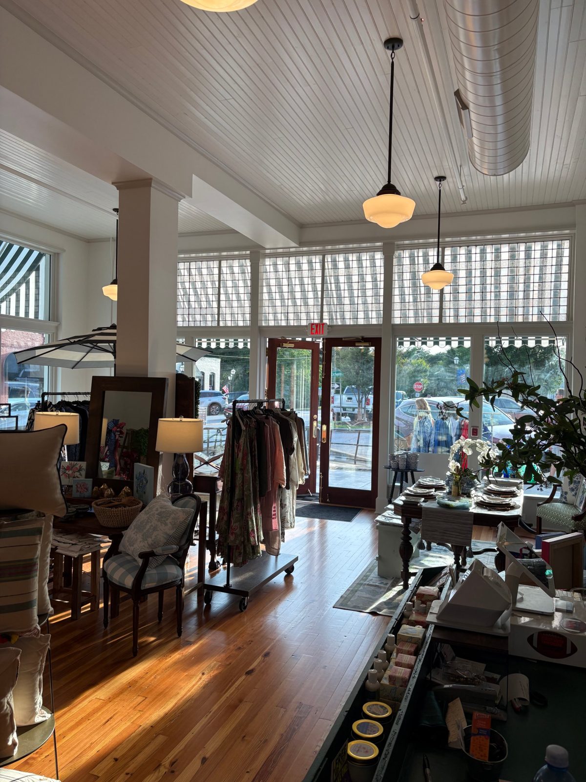 Inside Newtique, with sunlight on the wood floors